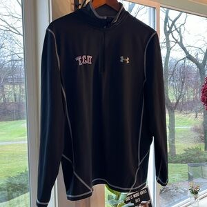 Med under armor cold gear loose fit black shirt.